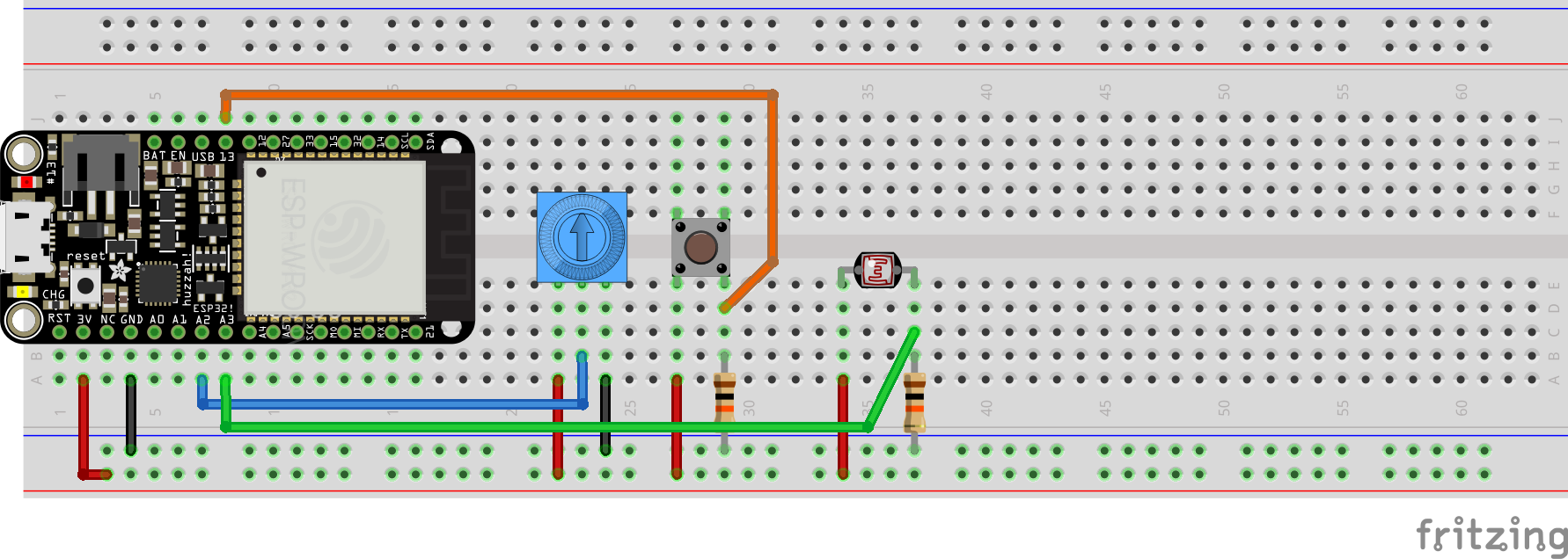 Adafruit ESP32 plugged into a breadboard with a potentiometer, a button and a photoresistor connected.